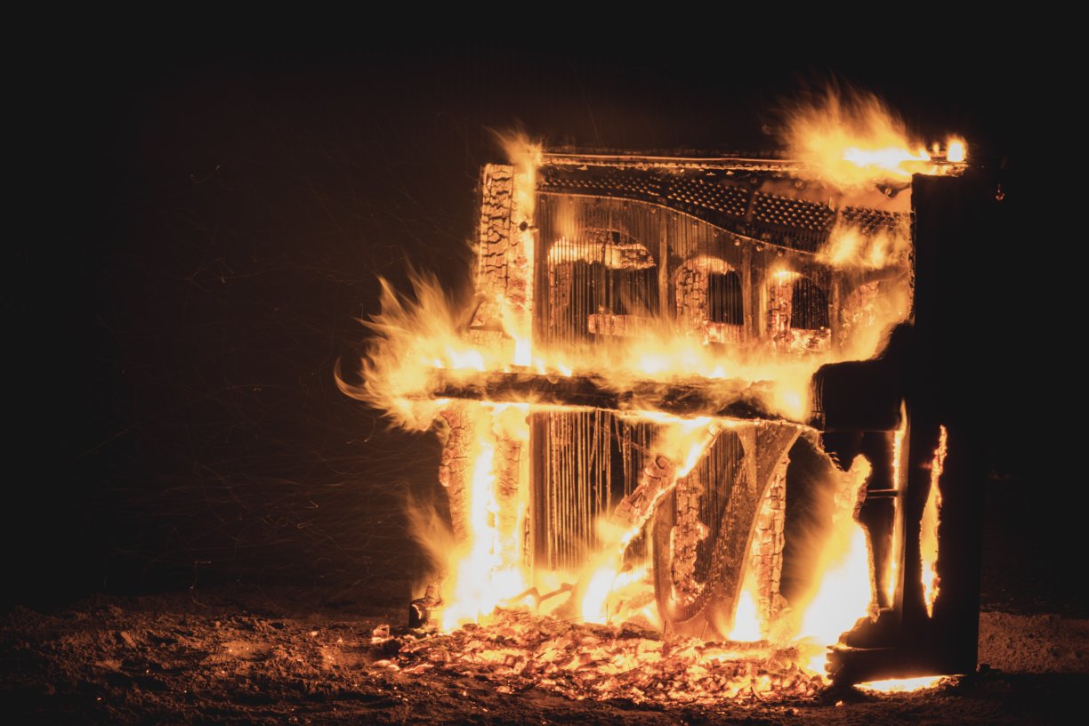 Credit: Piano Burning (2021) at Brisbane Festival. Photograph by Greg Harm